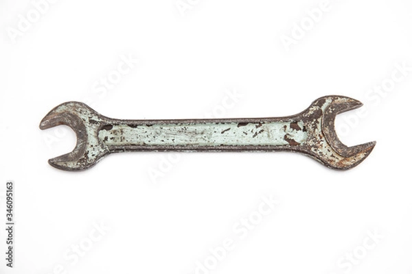 Fototapeta old spanner on a white background