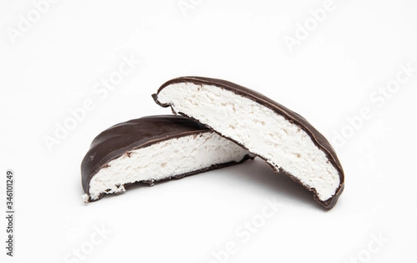 Obraz chocolate-covered marshmallows cut on a white background