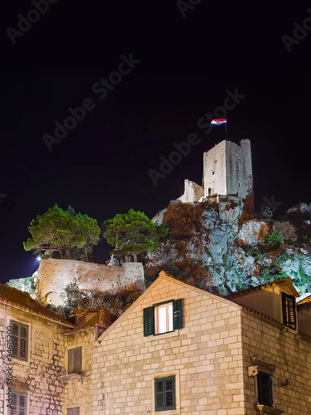 Obraz Old fort in Omis, Croatia at night