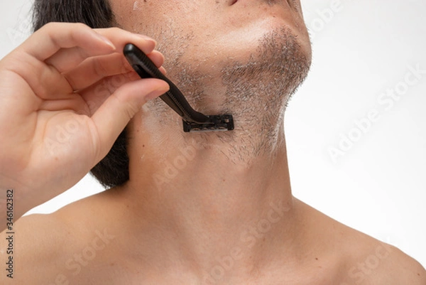 Obraz メンズ　カミソリによる髭剃り