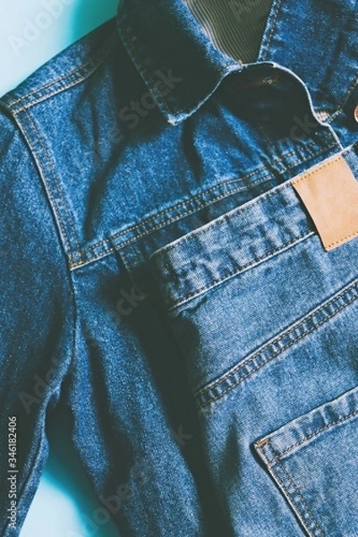 Obraz Blue denim jacket and jeans flat lay photography. Summer trendy outfit