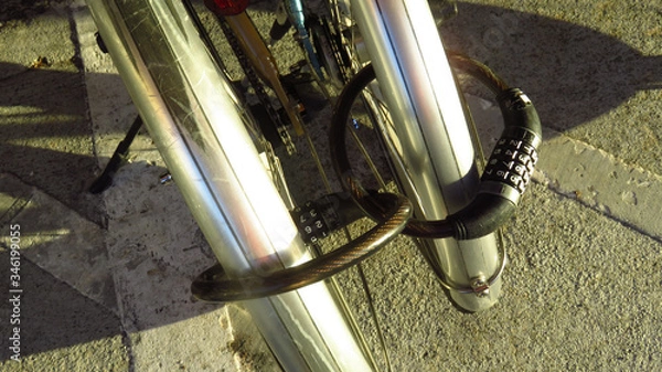 Obraz Bicycles Locked Together with Combination Padlocks
