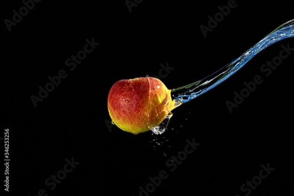 Obraz Apfel mit Wasserspritzer