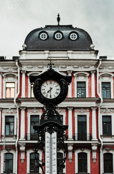 Obraz old clock in the city