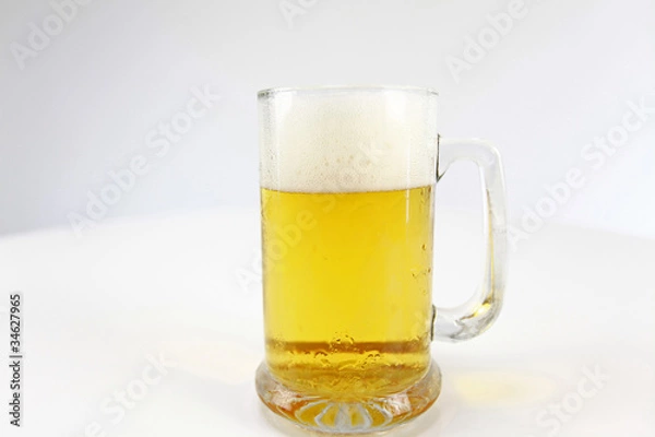 Fototapeta 卓上に置いた生ビールジョッキ