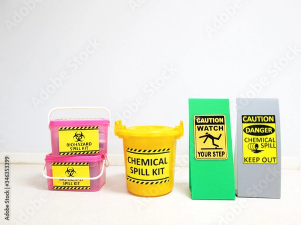 Fototapeta Chemical Spill kit yellow bucket and Biohazard Spill Kit with Warning danger caution hazard tag sign or symbol for emergency response situation when the chemical spill out, safety first in laboratory.