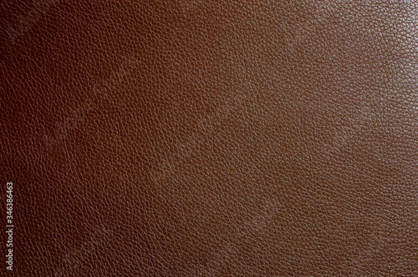 Fototapeta Artificial leather the color of milk chocolate. Faux leather texture
