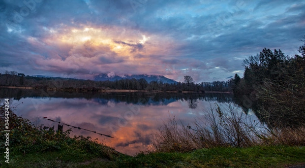 Obraz Sunset over still water