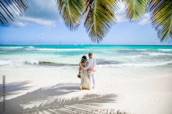 Fototapeta Wedding romantic couple on the beach in Dominican republic, Punta Cana  