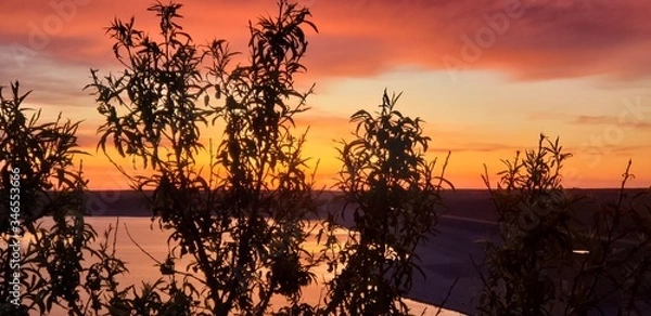 Fototapeta sunset over the river