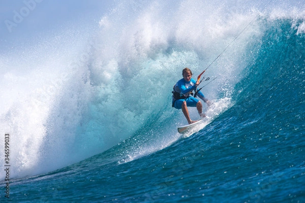 Obraz Kite surfer rides among the huge tubes and waves of the Indian Ocean on the island of Mauritius