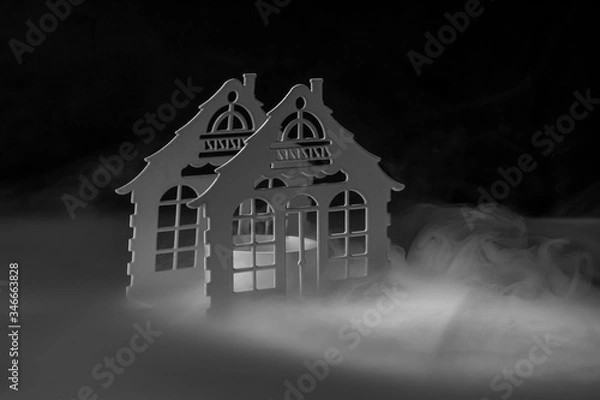 Obraz candlestick in smoke on a black background
