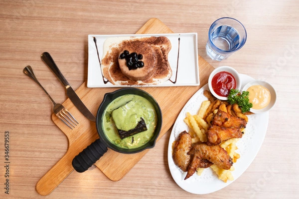 Obraz The different food was on the wooden table.