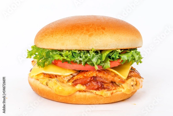 Fototapeta Cheeseburger with buns without sesame seeds shot on a white background