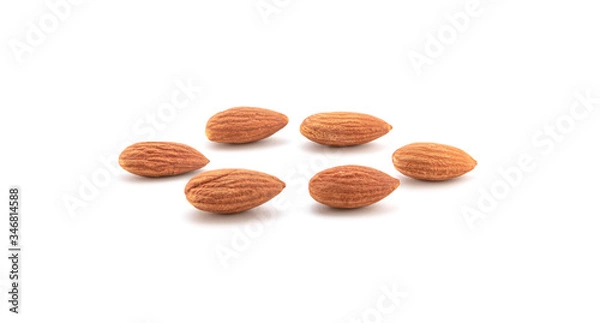 Obraz Group Almonds isolated on white.