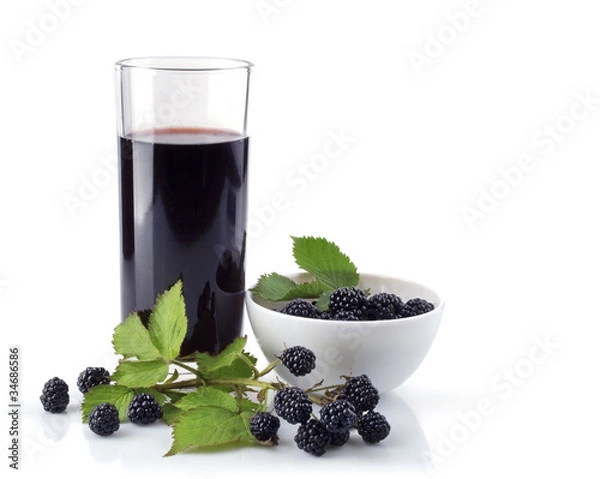 Fototapeta blackberry in plate and glass juice