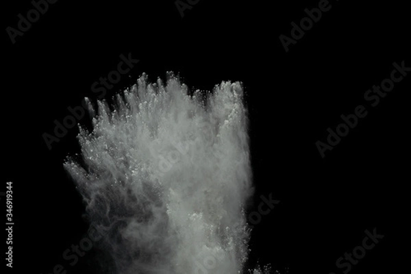 Obraz White powder explosion isolated on black background.