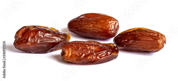 Fototapeta Dry dates on a white isolated background