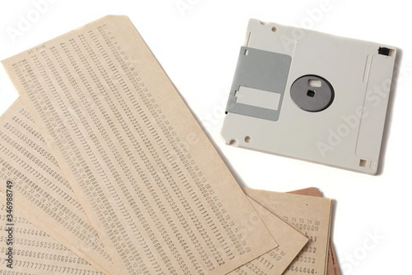 Obraz Punched card with floppy disk isolated