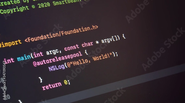 Obraz hello world application written in objective C on a computer screen