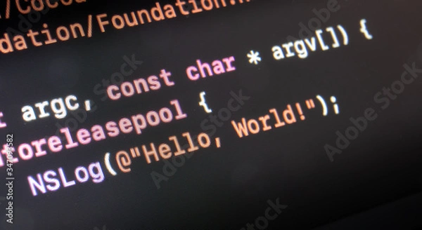 Obraz hello world application written in objective C on a computer screen