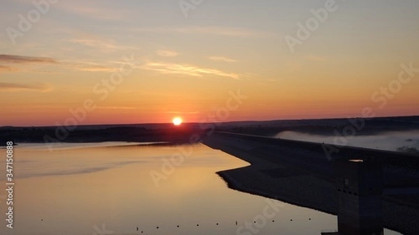Fototapeta sunset over the river