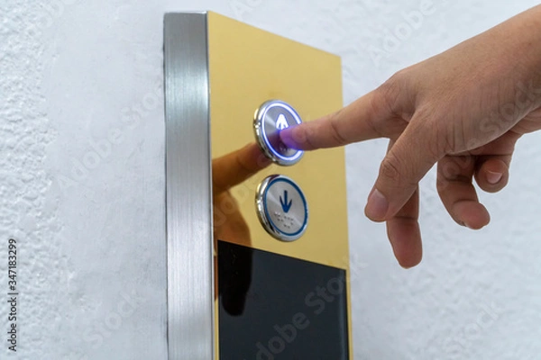 Obraz Hand push the elevator button up