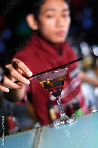 Obraz cocktail with bartender at background
