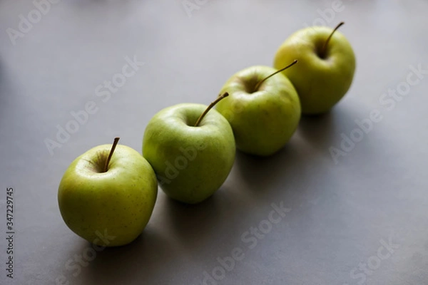 Fototapeta Apples on gray background