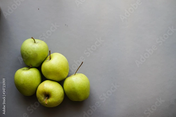 Fototapeta Apples on gray background