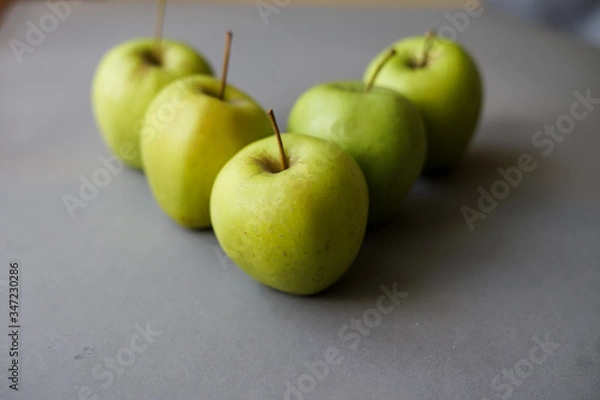 Fototapeta Apples on gray background