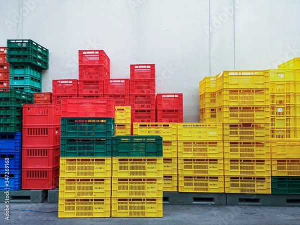 Fototapeta Colorful plastic box storage logistic.Empty box.