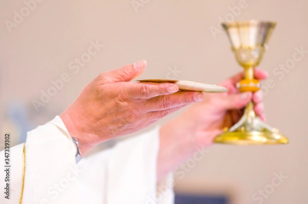 Obraz chalice with wine, blood of christ, and pyx with bread, body of christ, ready for the communion of the faithful