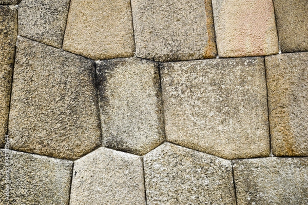 Fototapeta Vintage pattern stone background with abstract grunge texture of an old stone wall