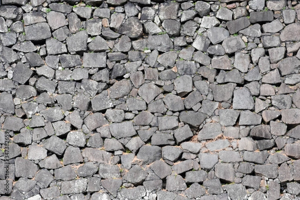 Fototapeta Vintage pattern stone background with abstract grunge texture of an old stone wall