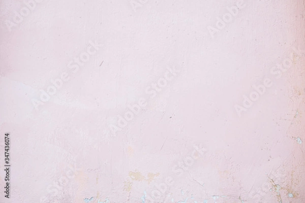 Fototapeta Pink concrete wall with chipped and scratches. Aged texture and background