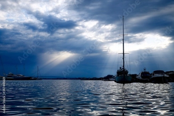 Fototapeta sailboat at sunset