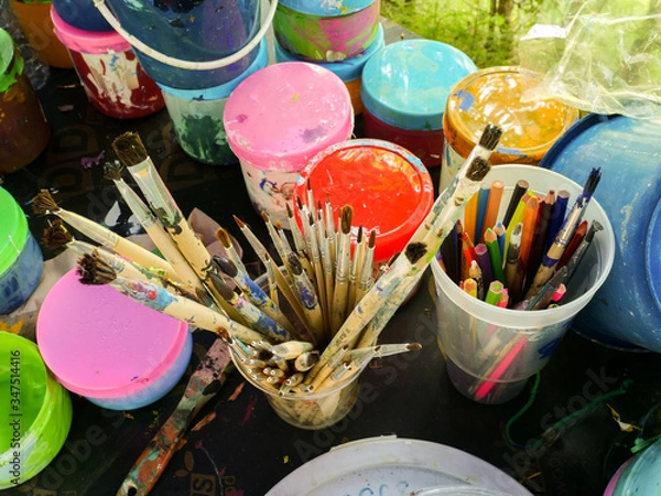 Obraz Used paint brushes and crayons