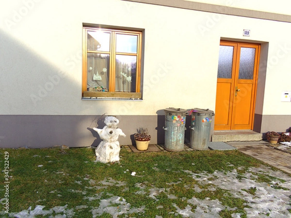 Obraz Sad melting snowman in spring