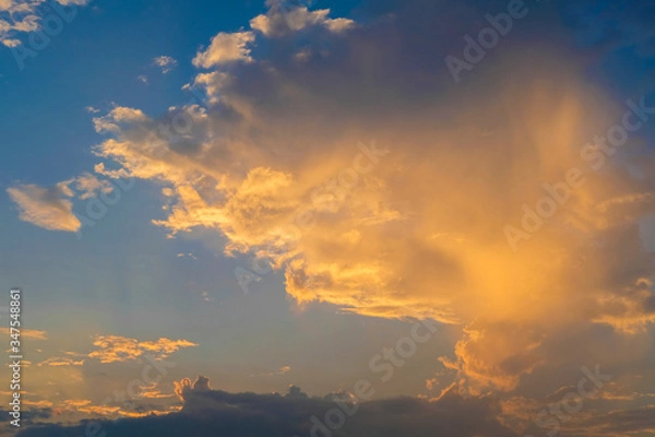 Obraz blue sky with golden orange cloud sunset