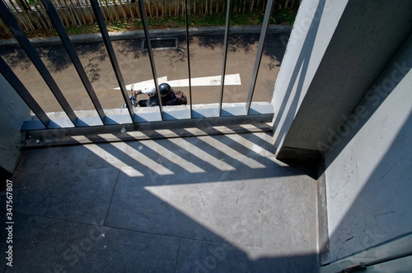 Obraz man walking down the stairs