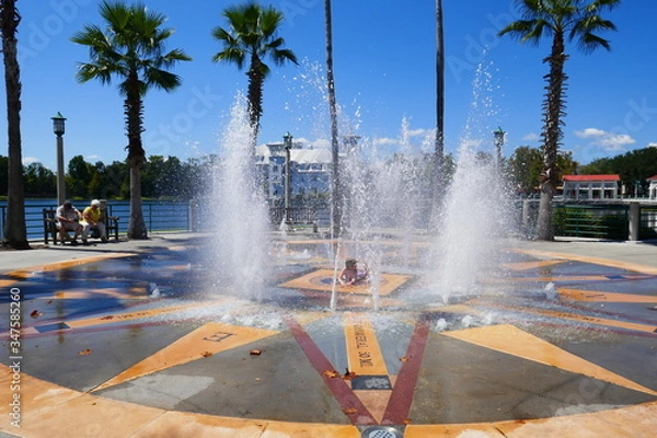 Obraz Water fontain in Front of a lake 