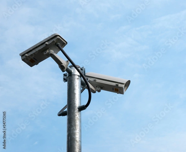 Fototapeta Security camera on the sky.