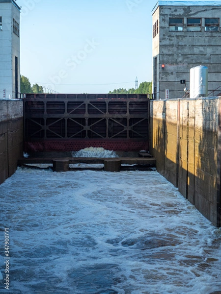 Obraz Waterworks on the river and river lock