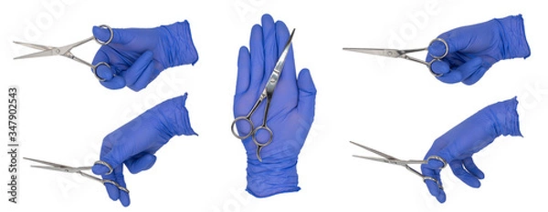 Obraz Woman's hand wearing a blue nitrile examination glove holding a pair of scissors in various poses. Isolated on a white background.  No Skin