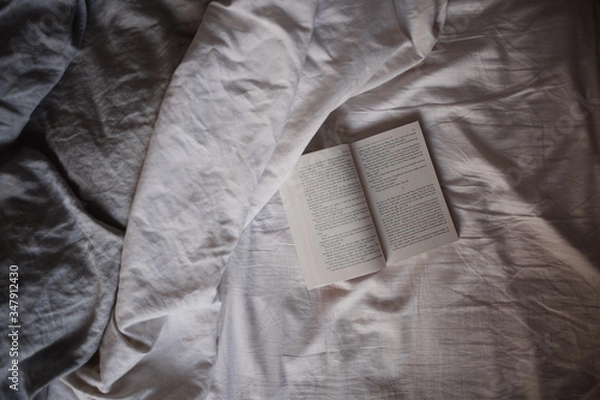 Obraz open book, linen, open, home, relax, soft, lifestyle, relaxation, still life, modern, one book, isolated, books isolated, book, bed, texture, copy space, coziness, text, top view, literature, inspire 