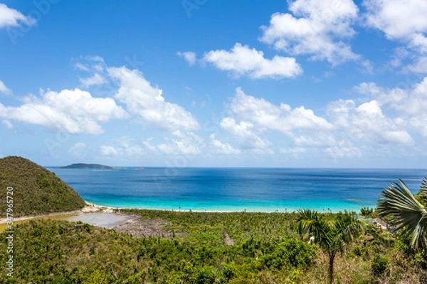 Fototapeta tropical beach with blue sky and clouds