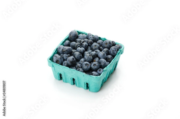 Fototapeta Pint container of blueberries on white