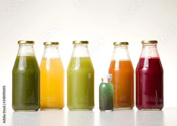 Fototapeta extract of various bottled vegetables and fruits