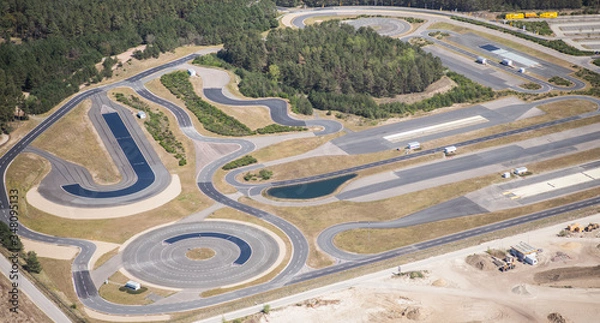 Fototapeta Driving safety training area with various practice routes - aerial view 